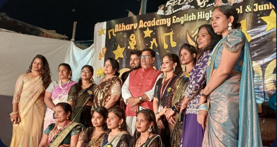 Atharv Academy students with teacher